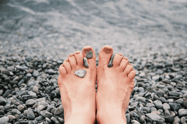 Feet on top of rocky terrain