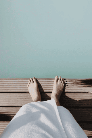 Feet on wood dock