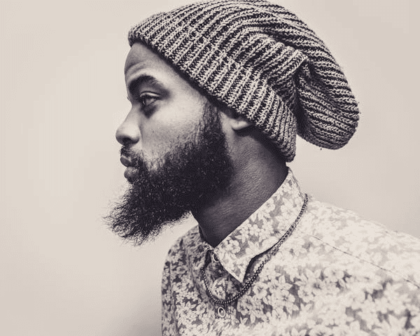 Sepia photograph of individual with beard
