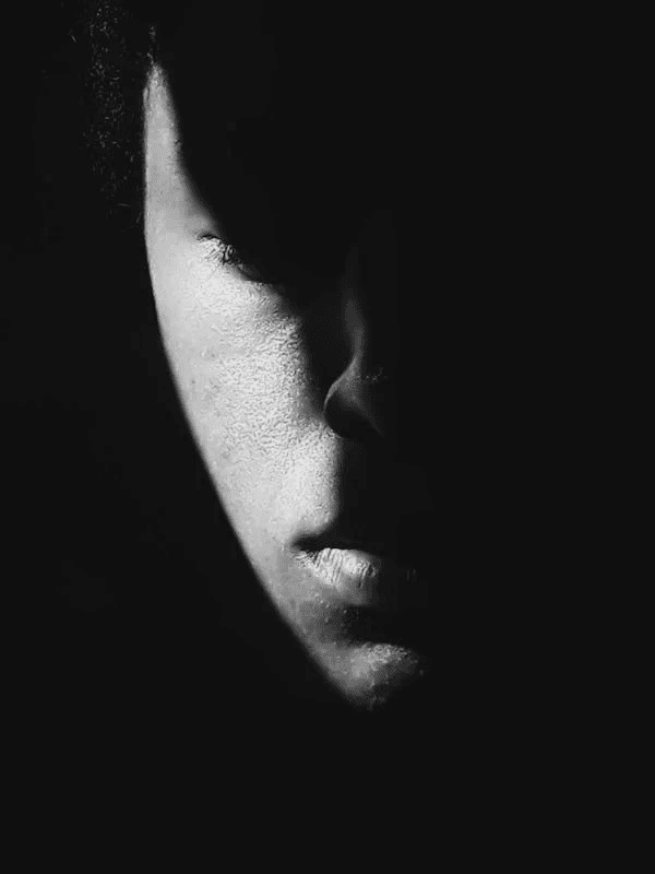 Profile of face in shadow