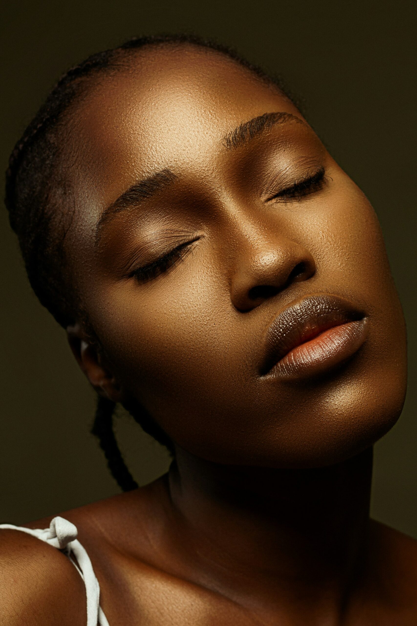 how to get even skin tone for black skin as depicted by a woman's face