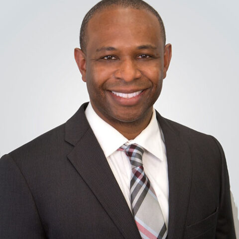Dr Reginald Rousseau