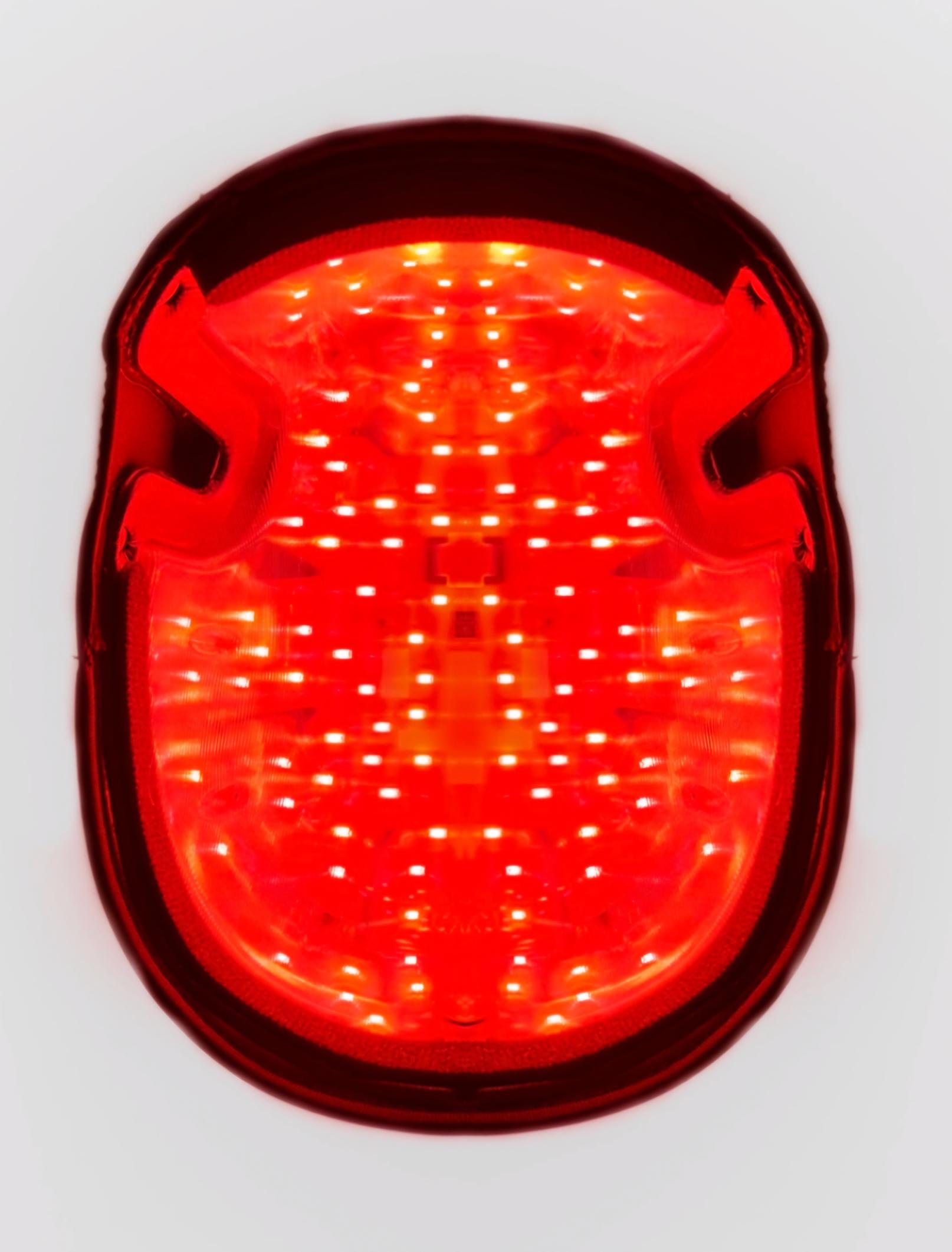 red light for hair thinning as depicted by the underside of a red light cap